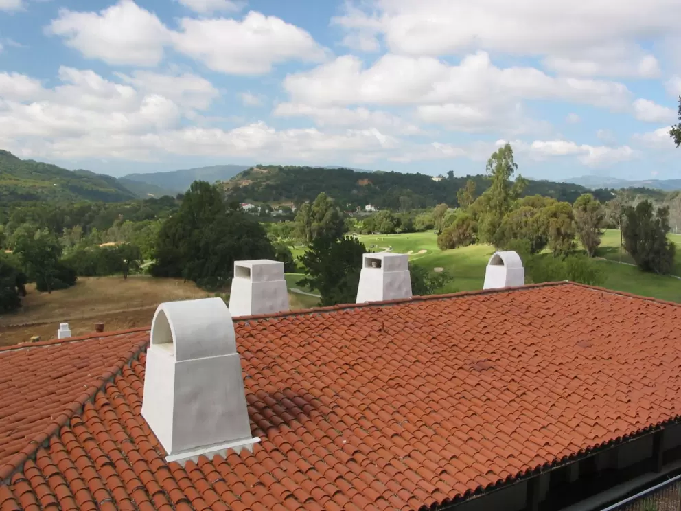 Spanish buildings and hillside. 