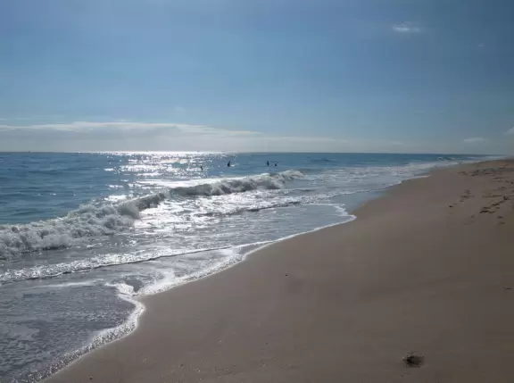 Quiet beach, popular with surfers.