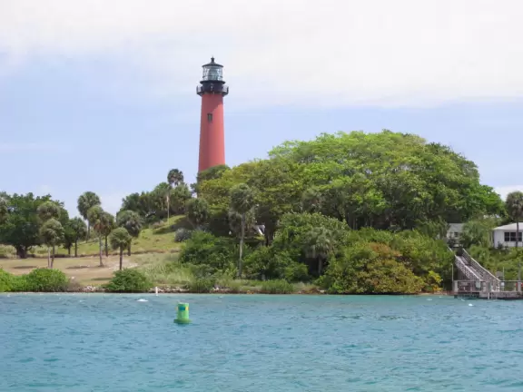 Pontoon boat tour of the mansions on Jupiter Island and the gorgeous clear waters of Jupiter Inlet.