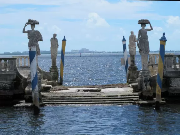 Bayside mansion with stunning waterfront "barge" and colorful geometric gardens.