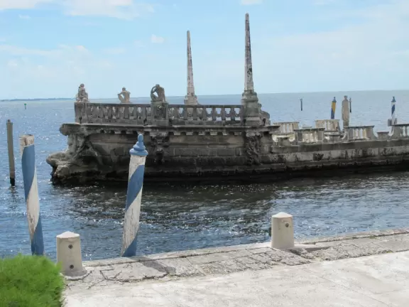 Bayside mansion with stunning waterfront "barge" and colorful geometric gardens.