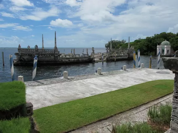 Bayside mansion with stunning waterfront "barge" and colorful geometric gardens.