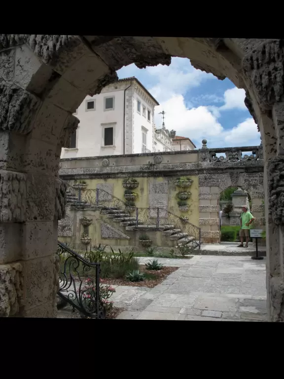 Bayside mansion with stunning waterfront "barge" and colorful geometric gardens.