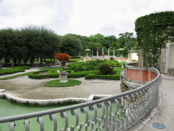 Bayside mansion with stunning waterfront "barge" and colorful geometric gardens.