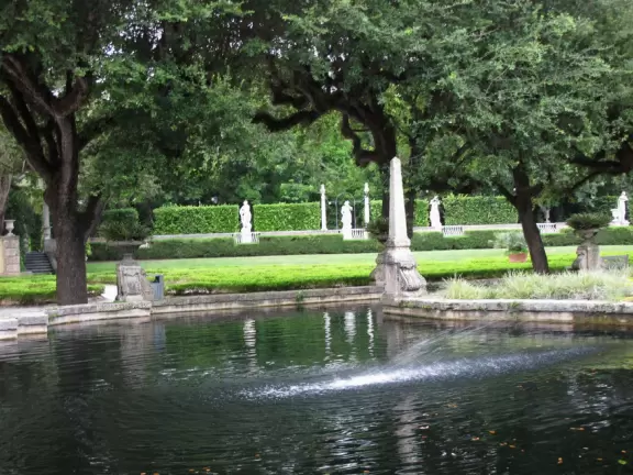 Bayside mansion with stunning waterfront "barge" and colorful geometric gardens.