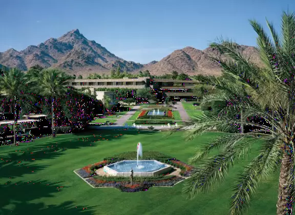 Historic resort with Wright-esque architecture and delightful sprite sculptures.