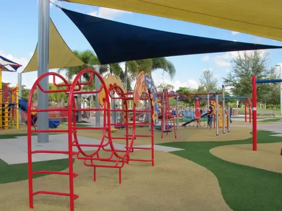 Incredible playground with so much play equipment! Jogging path, ducks on pond, huge skate park, and modern cafe as well.