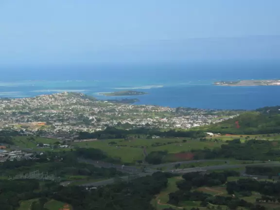 Grand views of haunted mountain ranges and Kaneohe below.