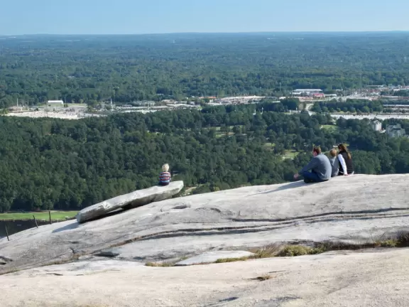 Giant granite mountain with Swiss skylift and village full of fun activities for kids!