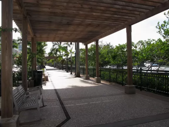 A happening spot with a sunken amphitheater by the water where kids can run in a splash pad and fountains are lit up at night.&nbsp; BurgerFi, Subculture Coffee, and a few restaurants.