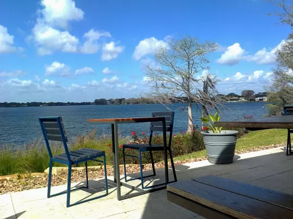 Paradise! A casual cafe on the water with adirondack chairs, picnic tables, and a great breeze!