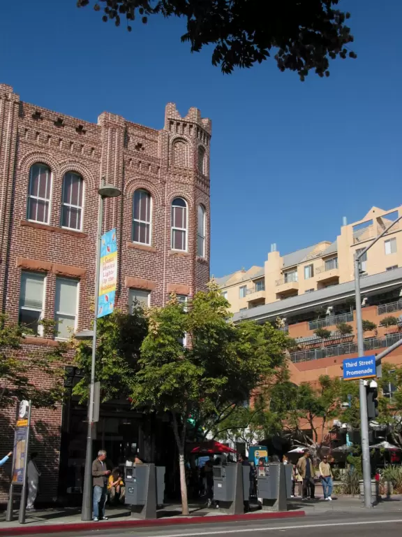 A pretty, pedestrian-only street, with performers, tons of people, and lots of shopping.