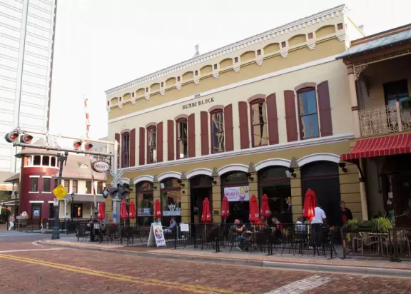 Great restaurants among moss-draped trees (Thornton Park), lit-up highrises at night (Orange Ave), and sun-worshippers enjoying Lake Eola Park.