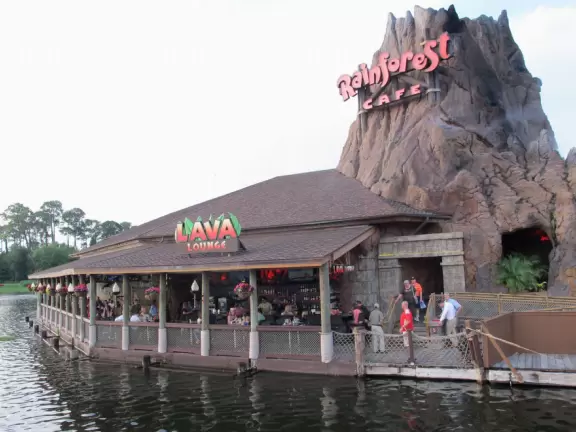 Waterfront area with restaurants, live street performers, entertainment, toy stores, and carousel.