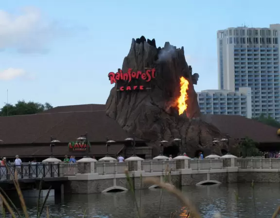 Waterfront area with restaurants, live street performers, entertainment, toy stores, and carousel.
