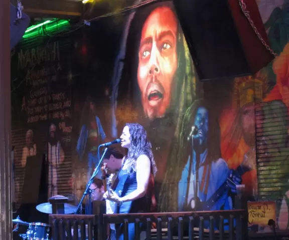 A cozy street where the locals go to hear live music.