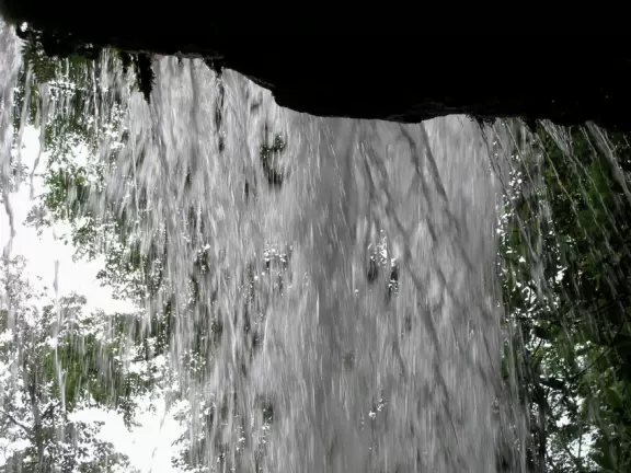 Lovely walk past flowers galore to a waterfall you can stand behind.
