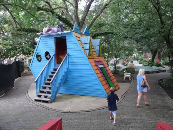 Whimsical sculptures of fairy tale scenes in the middle of a giant oak forest with Spanish moss and vines. Magic!