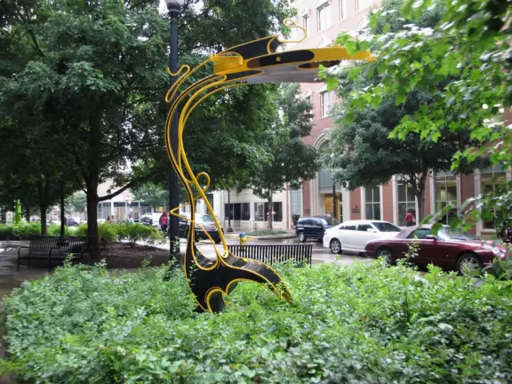 Cute square with sidewalk cafes and a splash fountain.