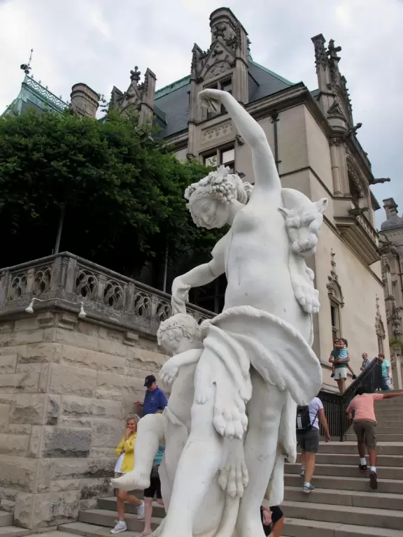 Grand estate with beautiful furnishings, countryside views, indoor pool, and gardens.