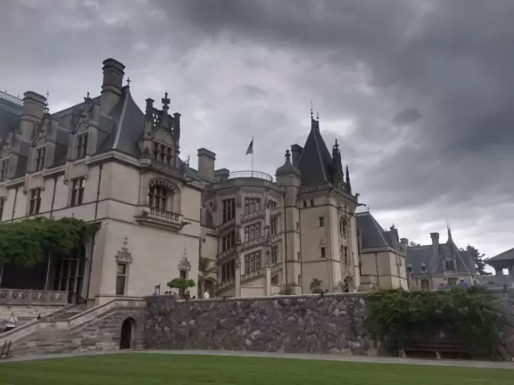 Grand estate with beautiful furnishings, countryside views, indoor pool, and gardens.