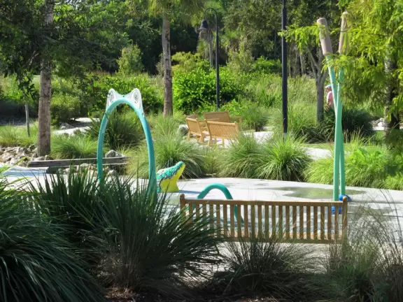 Amazing barrier-free playground with gorgeous splash pad and landscaping.