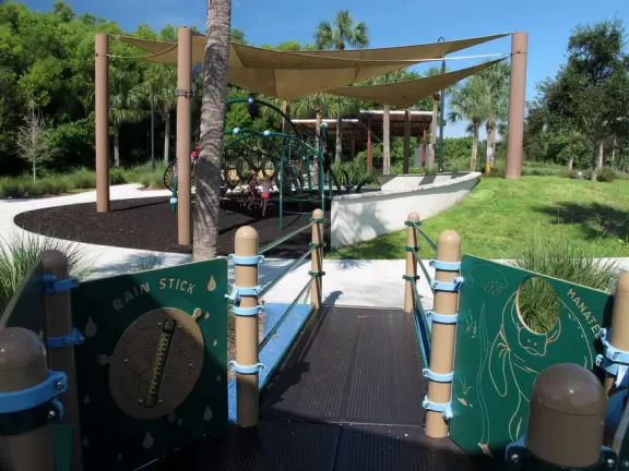 Amazing barrier-free playground with gorgeous splash pad and landscaping.