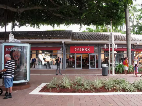 A touristy waterfront mall with restaurants and stalls with souvenirs.