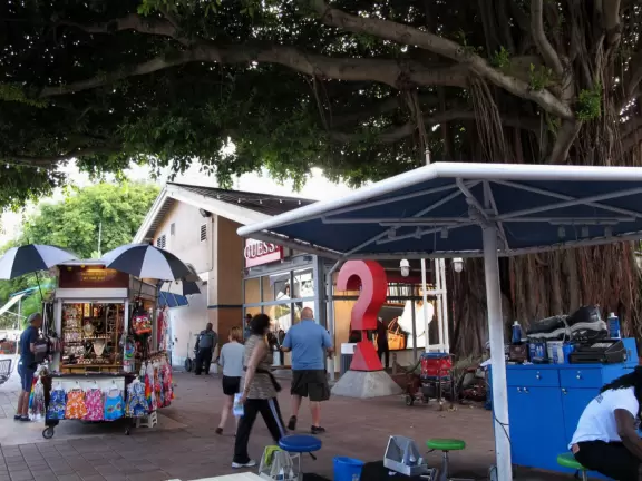 A touristy waterfront mall with restaurants and stalls with souvenirs.