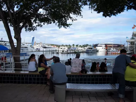 A touristy waterfront mall with restaurants and stalls with souvenirs.