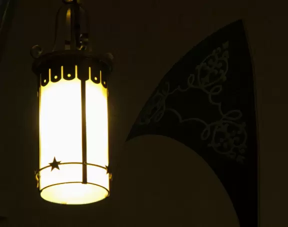 Stunning Spanish Renaissance style church with peaceful blue interior and Tiffany glass windows.