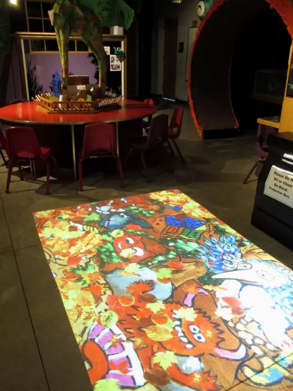 A whimsical room filled with high-tech activities for kids, plus a great cafe.