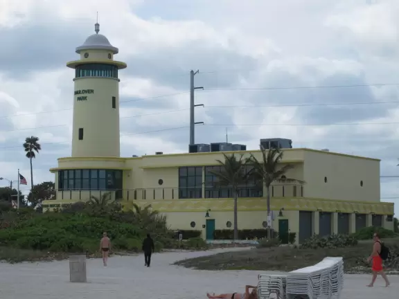 Beautiful beach with golden sand and turquoise water, plus a clothing-optional area.