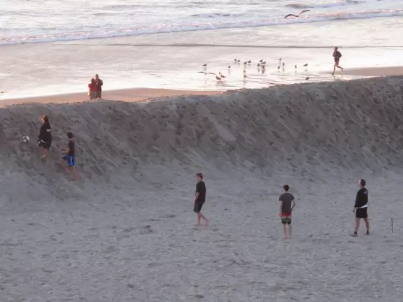 Sit atop the cliffs and watch the sunset over Moonlight State Beach!