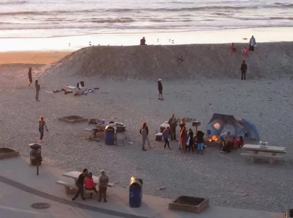 Sit atop the cliffs and watch the sunset over Moonlight State Beach!