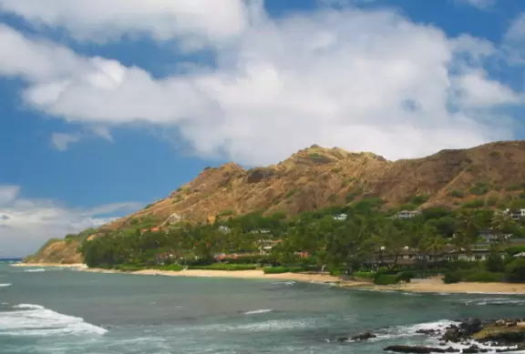 Gorgeous ocean views and an attractive lighthouse. Watch the surfers below!