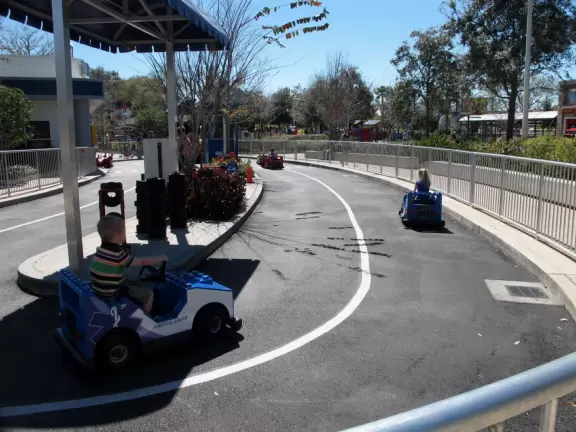 Theme park for young children with lots of rides, with short lines, in a beautiful setting.