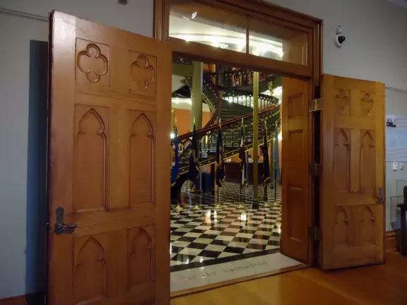 An incredible Gothic castle-like capitol building that stands high on a bluff.