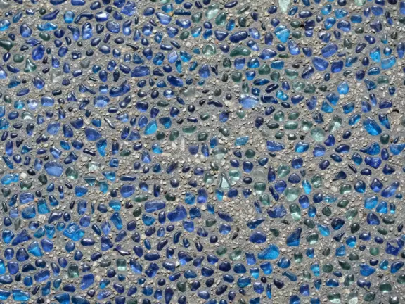 Modern playground with Chumash Indian huts and canoe, seals and whales to climb, roller slide, rainbow bridge, and bald eagle in a nest.