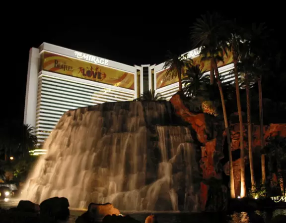 An oasis of lush landscaping, waterfalls galore, a volcano that erupts, and a classy casino with tropical fish tank.