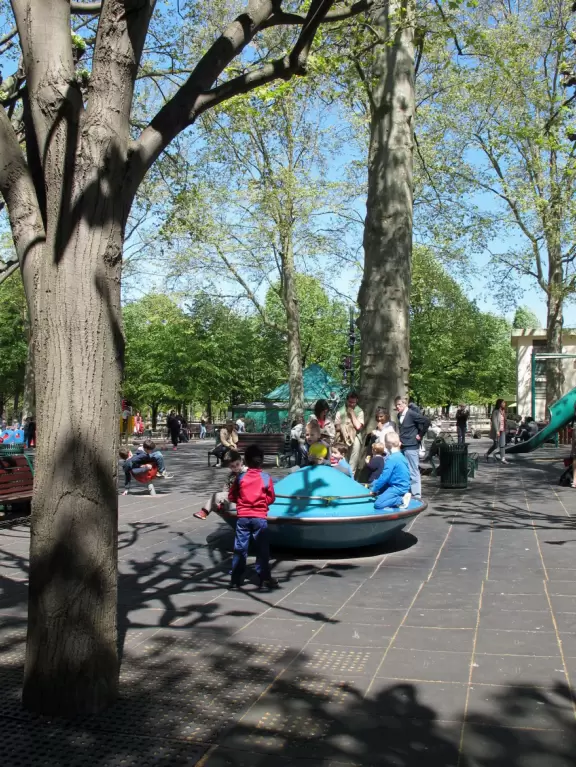 Super fun playground with adorable trees. Every imaginable play structure.