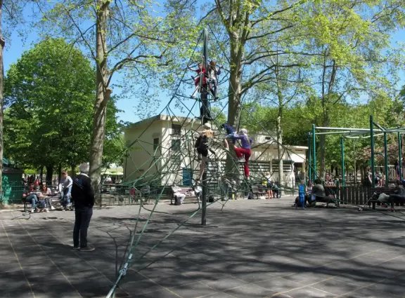 Super fun playground with adorable trees. Every imaginable play structure.