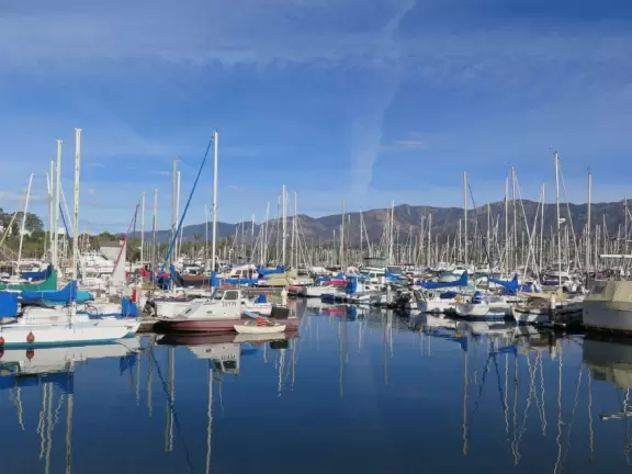 Stroll to the end of the breakwater while waves tumble over the sea wall! Sip a pomegranate margarita at an attractive bar!