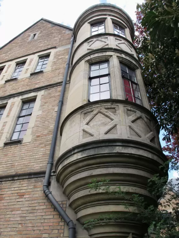 Gorgeous complex with 40 student residences themed after different countries, cafeterias, classrooms, and beautiful quads with flowers and trees.