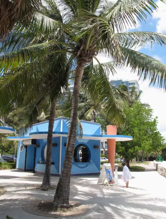 Gorgeous ocean colors, fun crowd of families, shallow water with little bouncy waves.