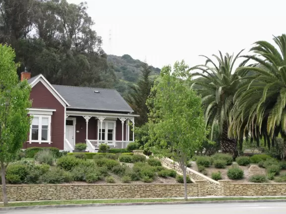 Lovely neighborhood walk past sweet houses and gardens, near fragrant hills with eucalyptus and wildflowers, plus a playground and lawn.