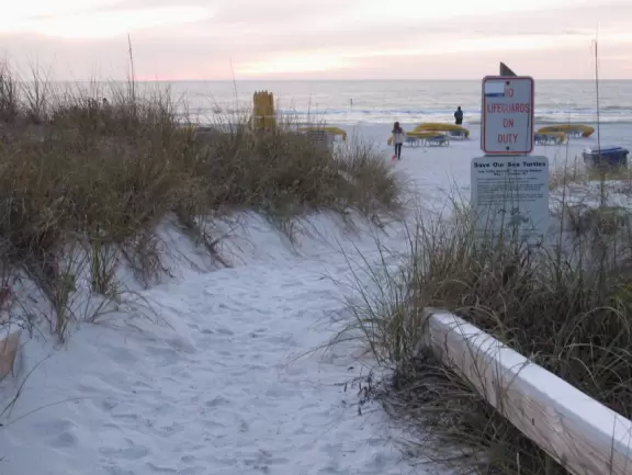 Magical sunsets where the shore is lit up orange are a delight at this beach.