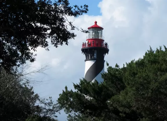 Broad beach with sand that has red flecks!