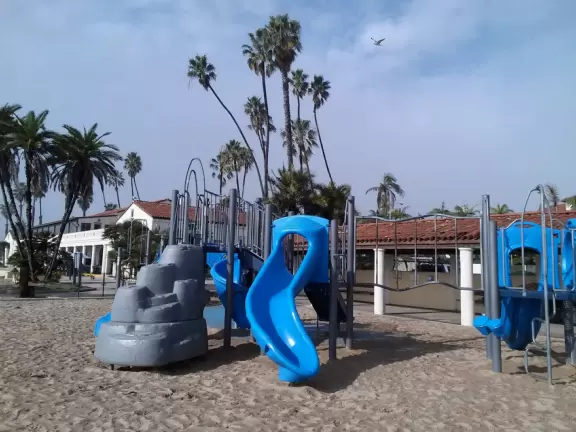 A wide sandy beach that's fun for kids! Wonderful for a long walk around the red cliffs.