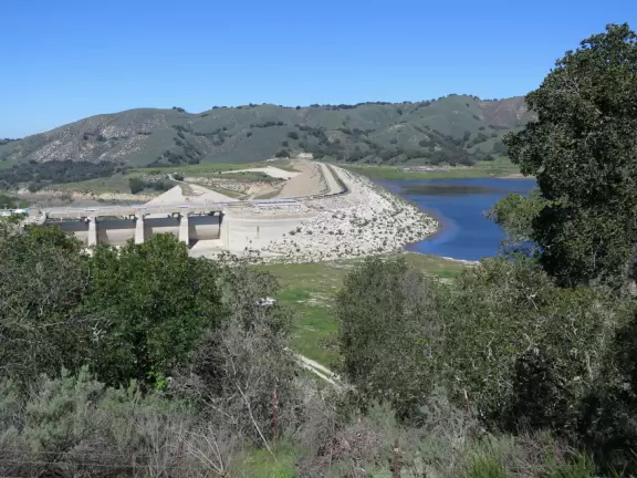 Two lookouts, one of the deep blue Lake Cachuma, and one of Bradbury Dam.